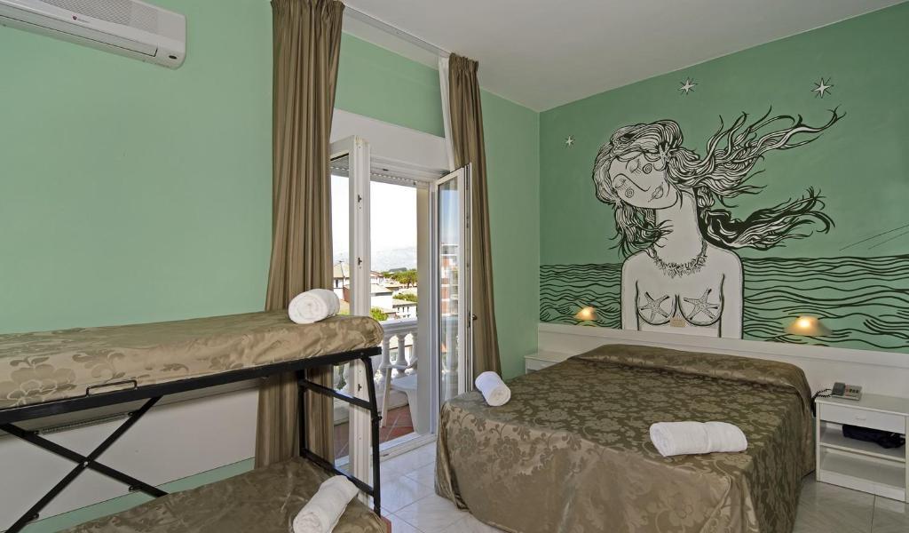 Hotel Regina Lido di Camaiore Rum bild