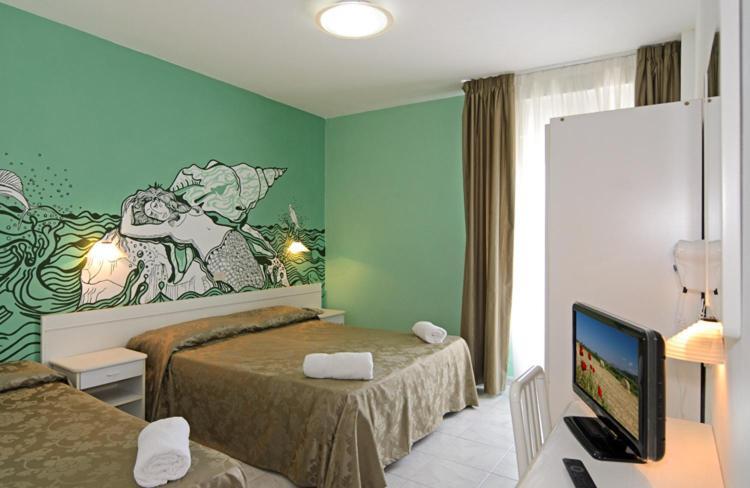 Hotel Regina Lido di Camaiore Rum bild